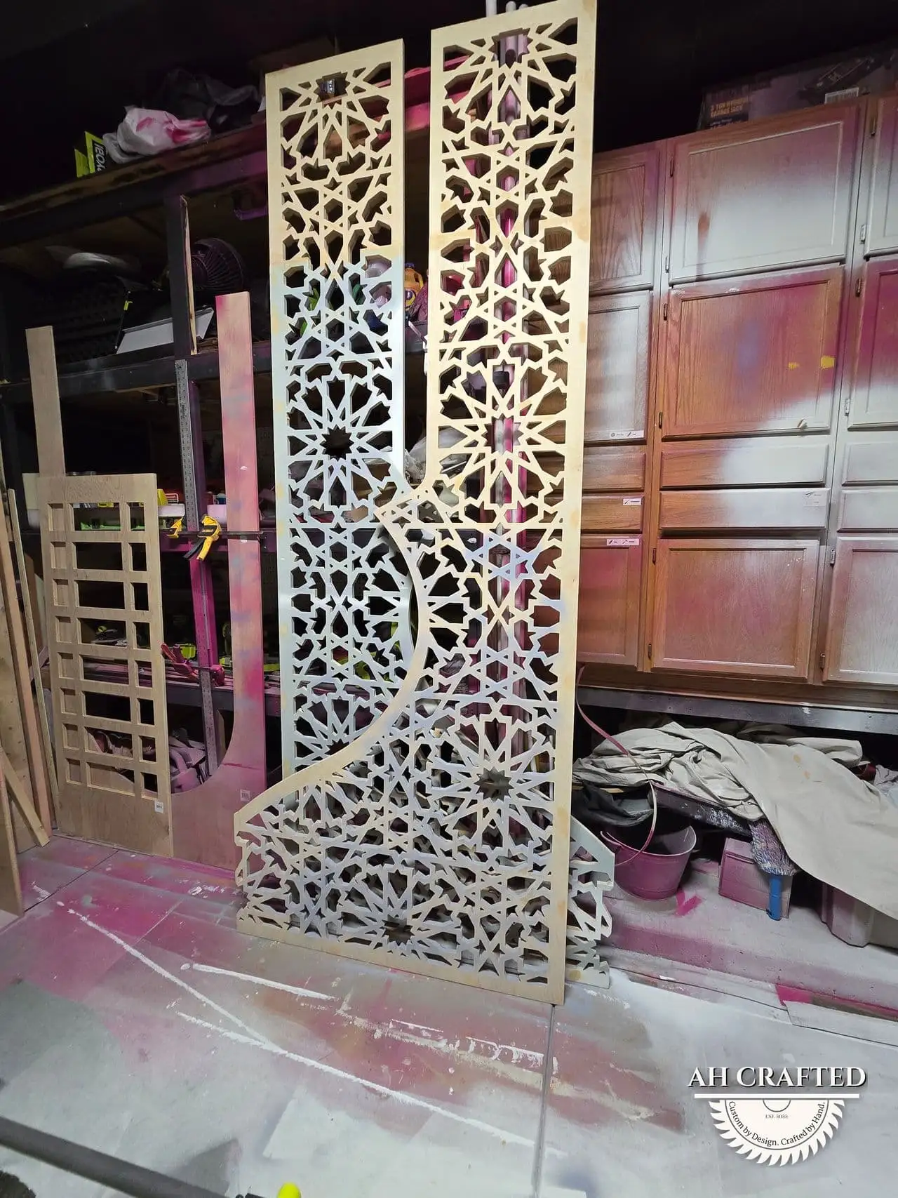 Pearl Matrix Arch — soft-cream CNC cutout boxed panels forming a mihrab arch, built by AH Crafted.