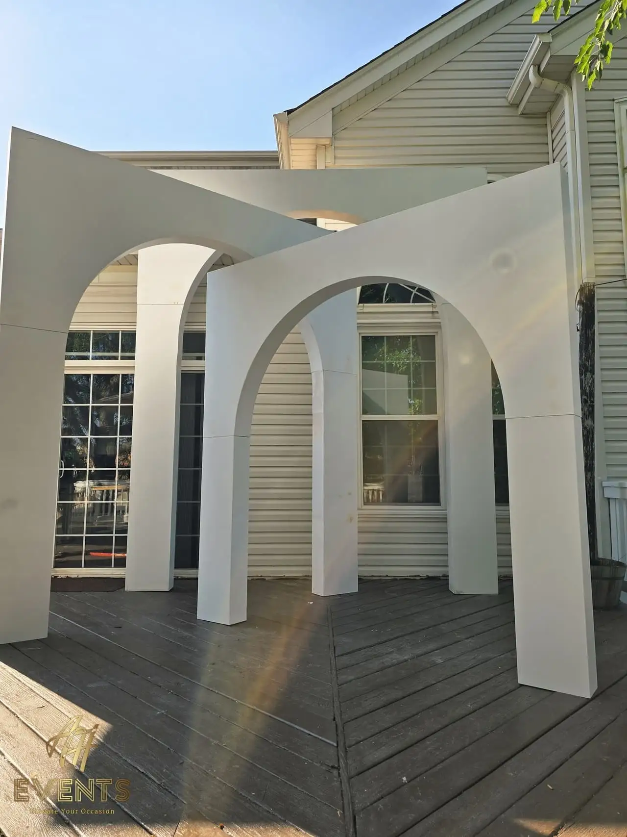 Volumetric Arc Suite — a custom sculptural backdrop built by AH Crafted.