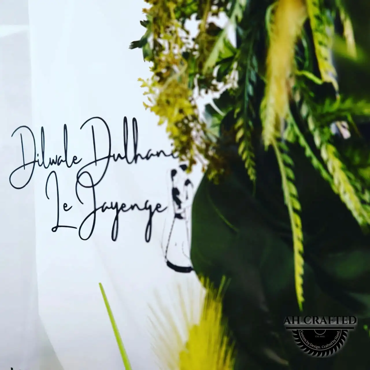 Photo Booth — a Vogue-style magazine-cover photo frame in black with green florals, built by AH Crafted.