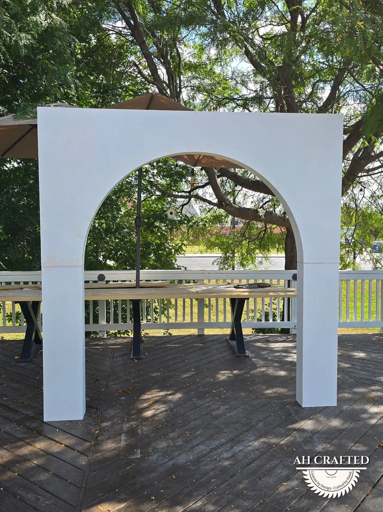 Volumetric Arc Suite — a custom sculptural backdrop built by AH Crafted.