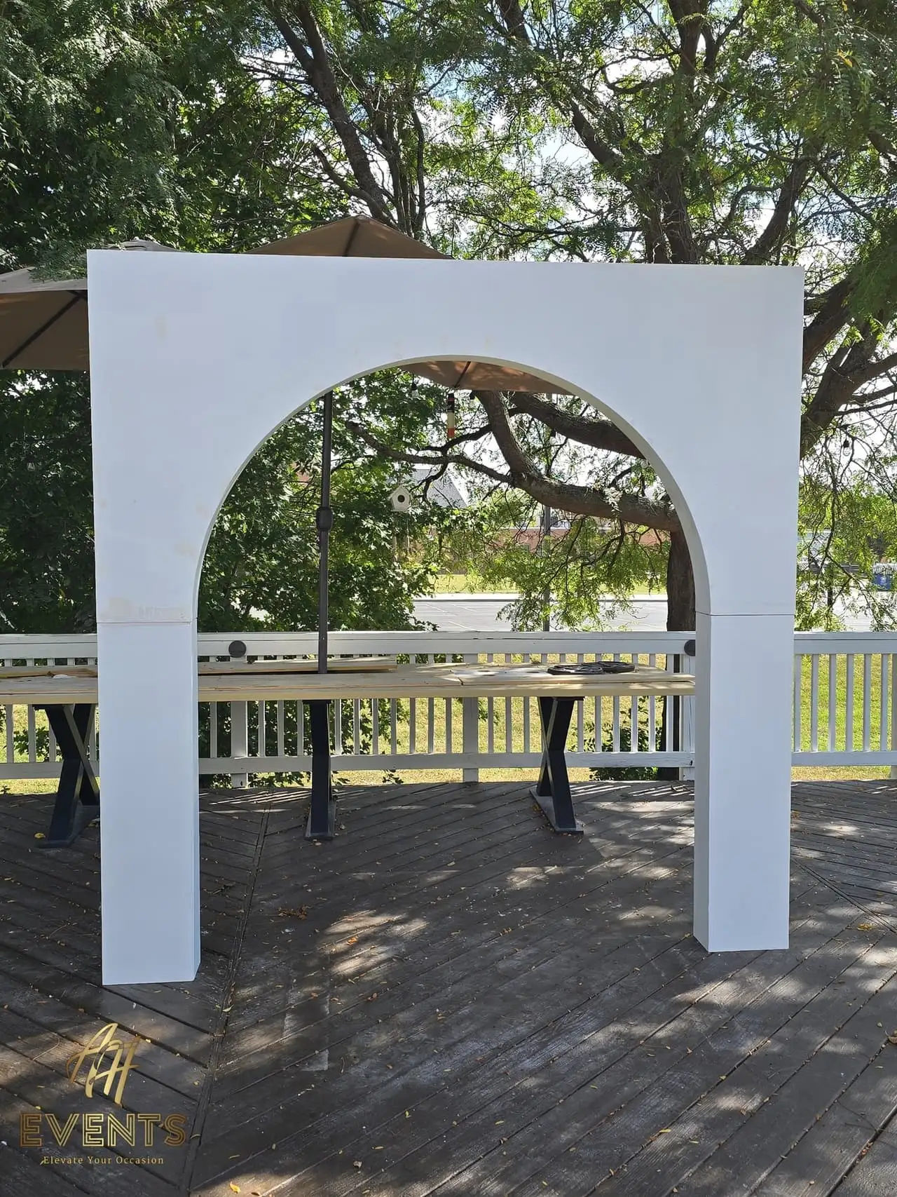 Volumetric Arc Suite — a custom sculptural backdrop built by AH Crafted.