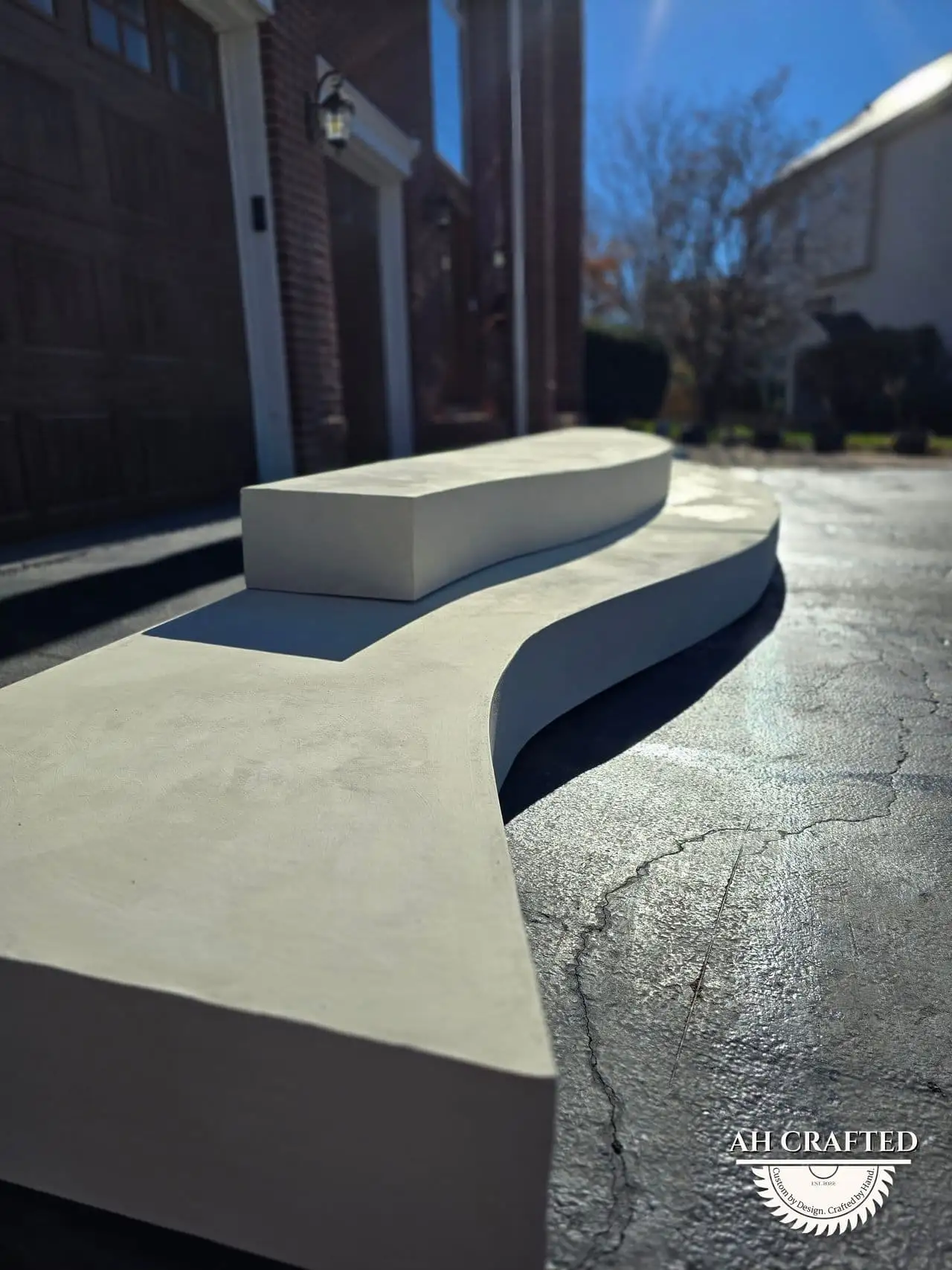 Classical Pillar Arch & Stage — a custom arch & contoured stage built by AH Crafted.