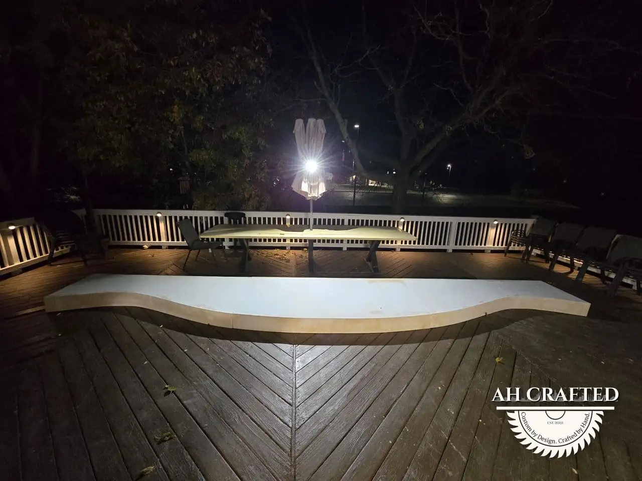 Classical Pillar Arch & Stage — a custom arch & contoured stage built by AH Crafted.