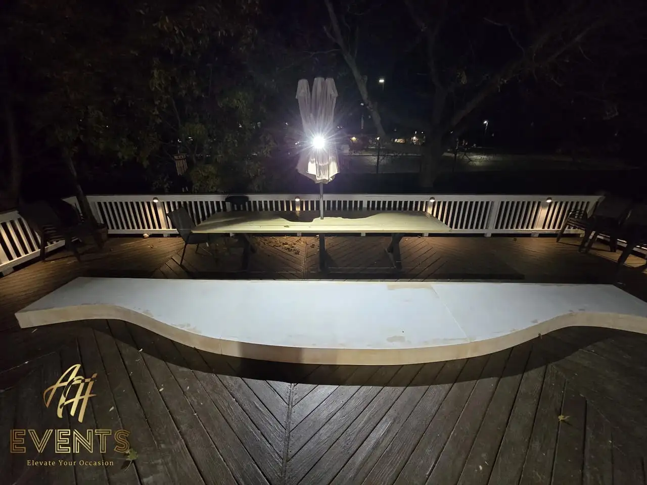 Classical Pillar Arch & Stage — a custom arch & contoured stage built by AH Crafted.