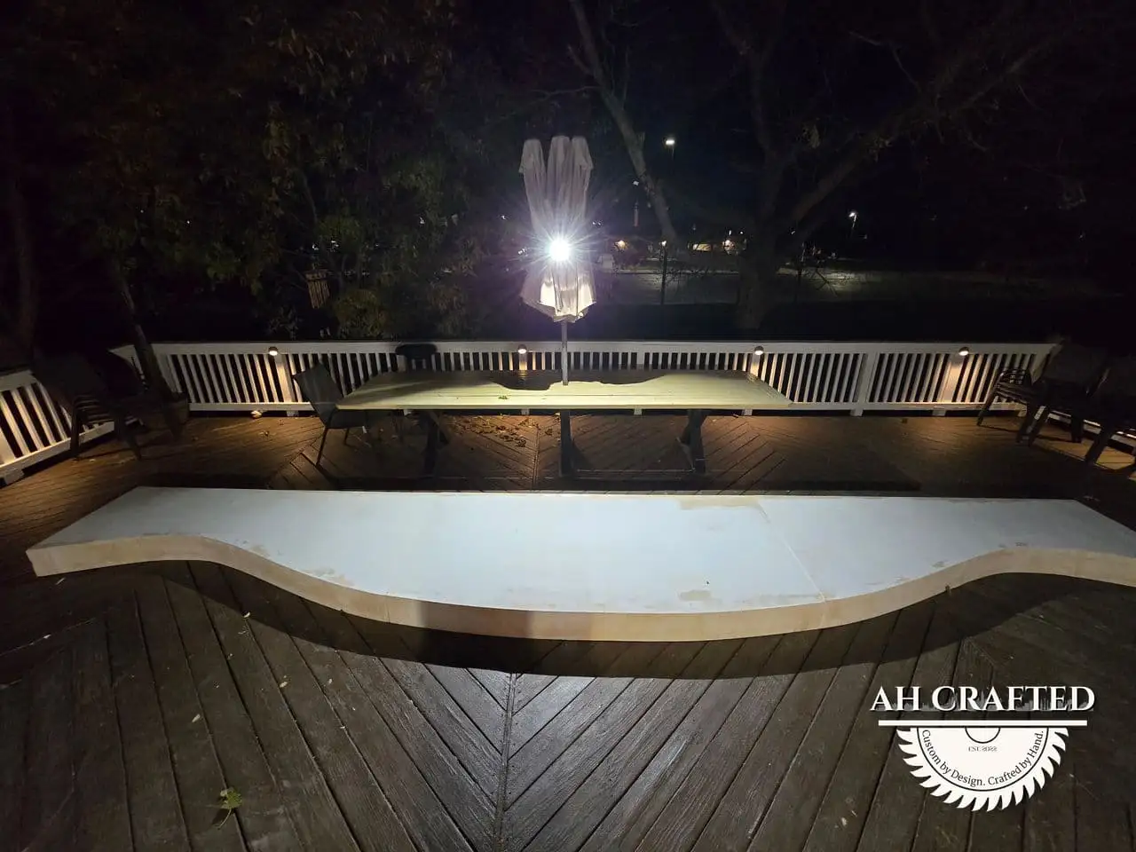 Classical Pillar Arch & Stage — a custom arch & contoured stage built by AH Crafted.