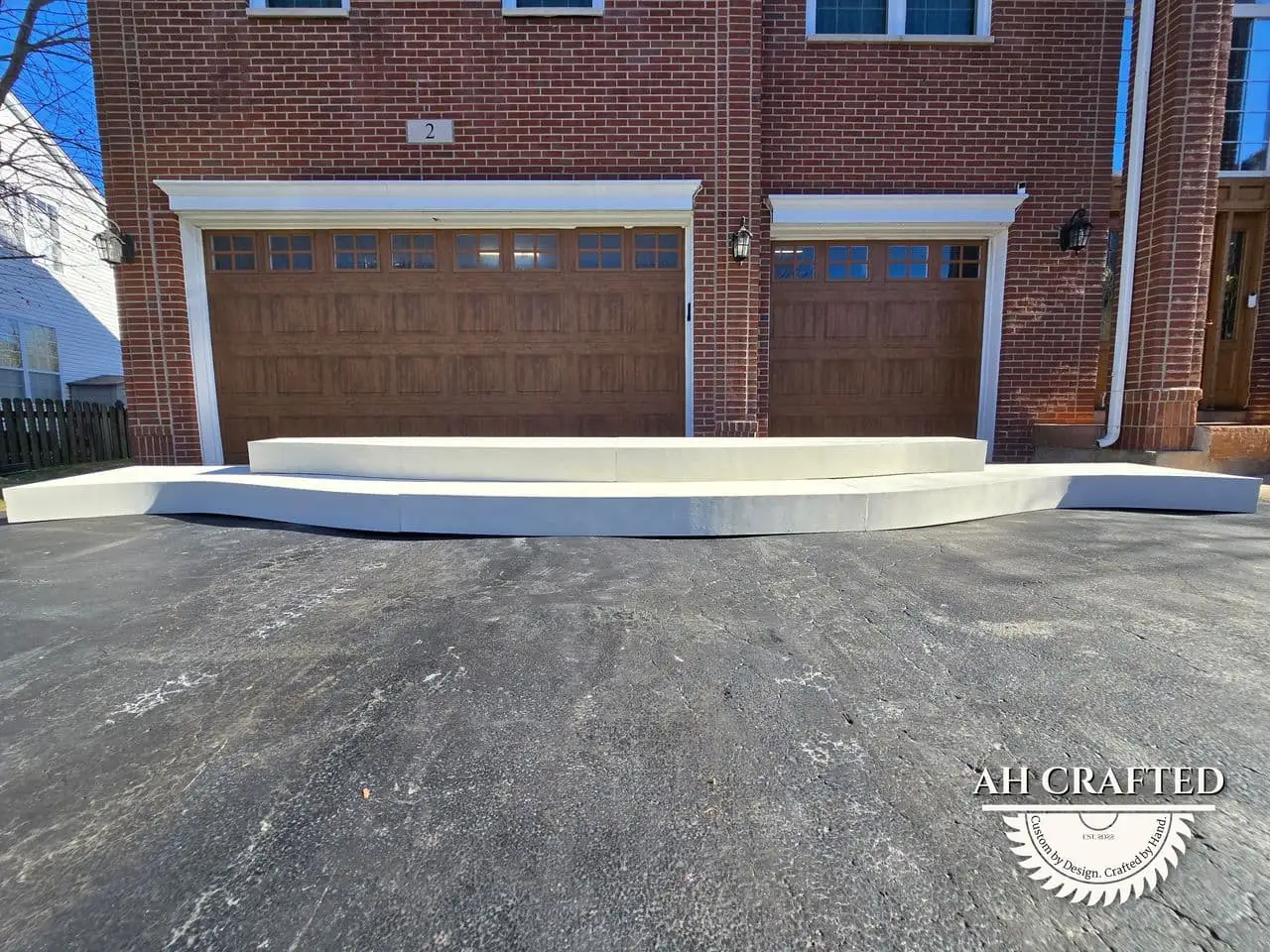Classical Pillar Arch & Stage — a custom arch & contoured stage built by AH Crafted.
