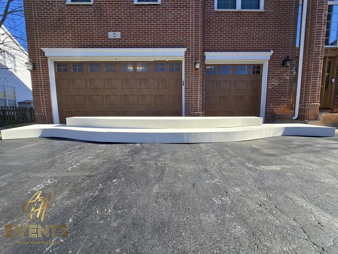 Classical Pillar Arch & Stage — a custom arch & contoured stage built by AH Crafted.