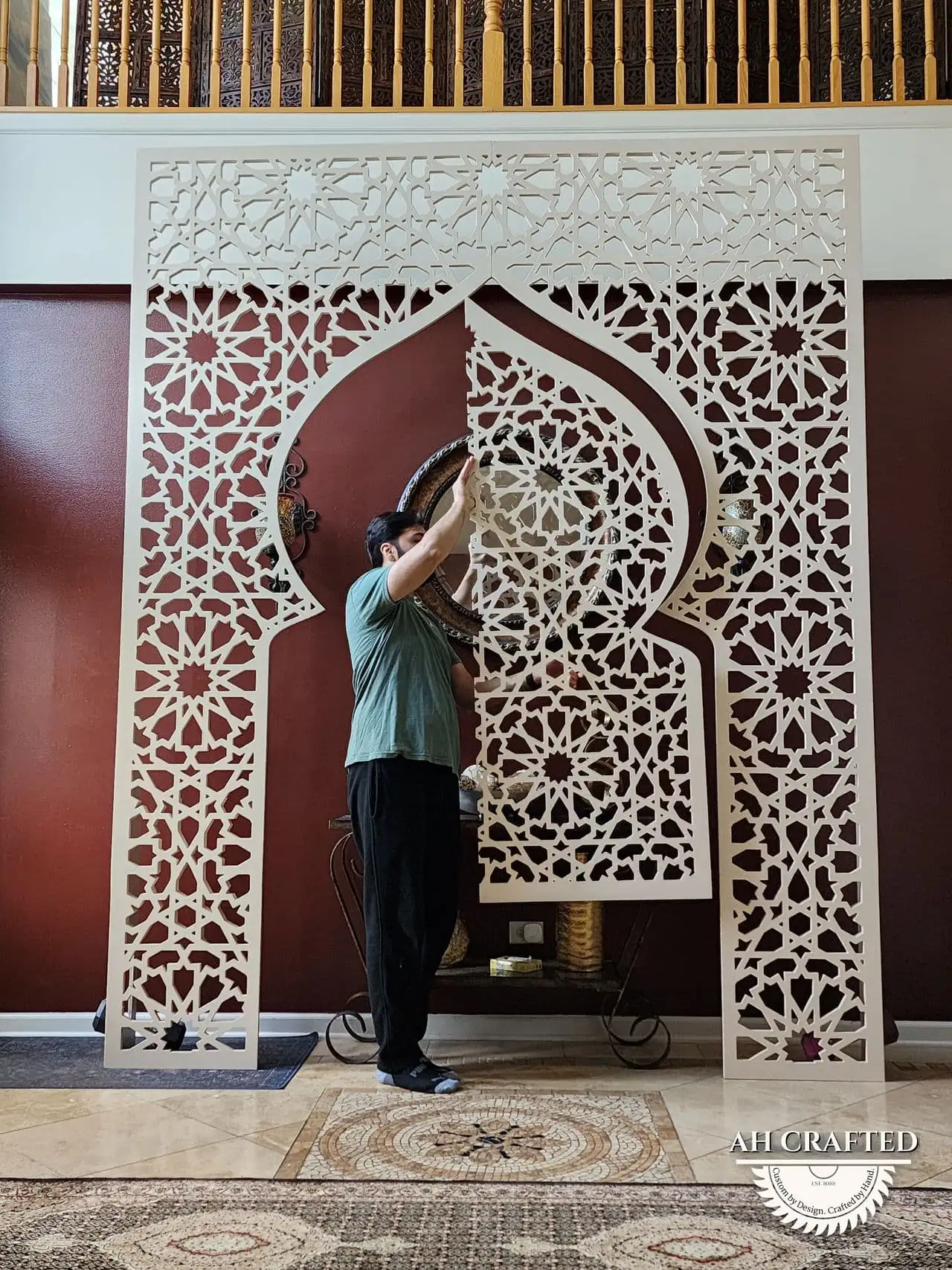 Pearl Matrix Arch — soft-cream CNC cutout boxed panels forming a mihrab arch, built by AH Crafted.