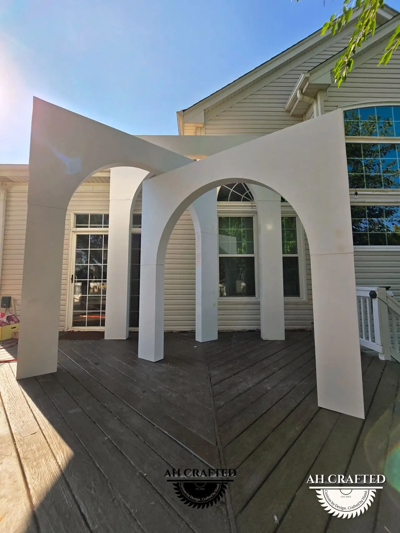 Volumetric Arc Suite — a custom sculptural backdrop built by AH Crafted.